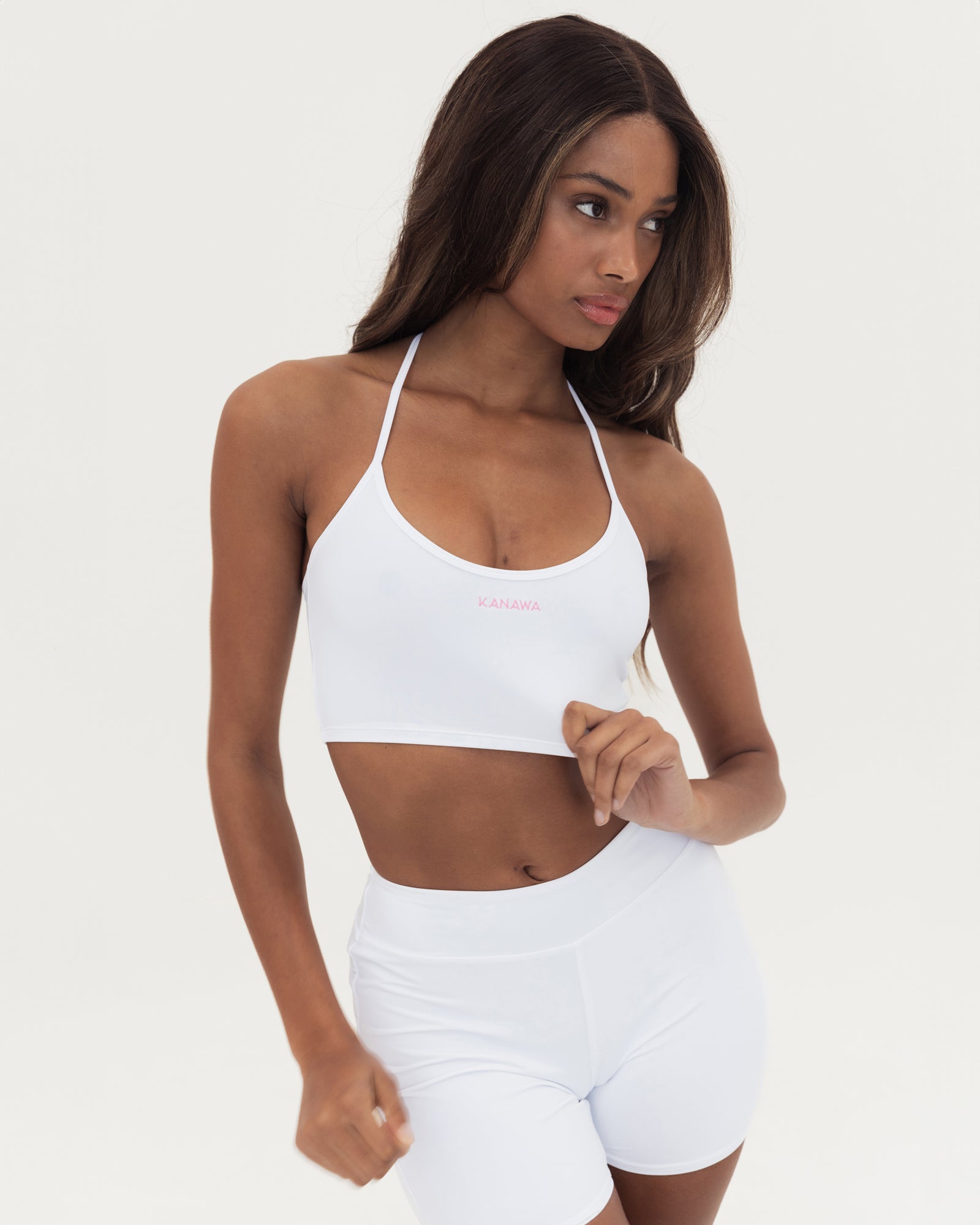 WHITE CROP TOP WITH KANAWA EMBROIDERED IN PINK Main image